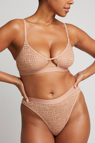 Detail view of Eyelet Lace Cutout Bra in Buff for sizer