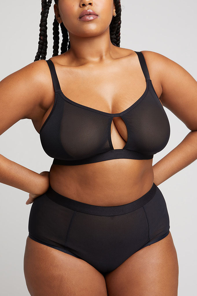 Foto Stock Detailed shot of a black bra with nipple cutouts and a