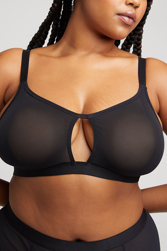 Foto Stock Detailed shot of a black bra with nipple cutouts and a