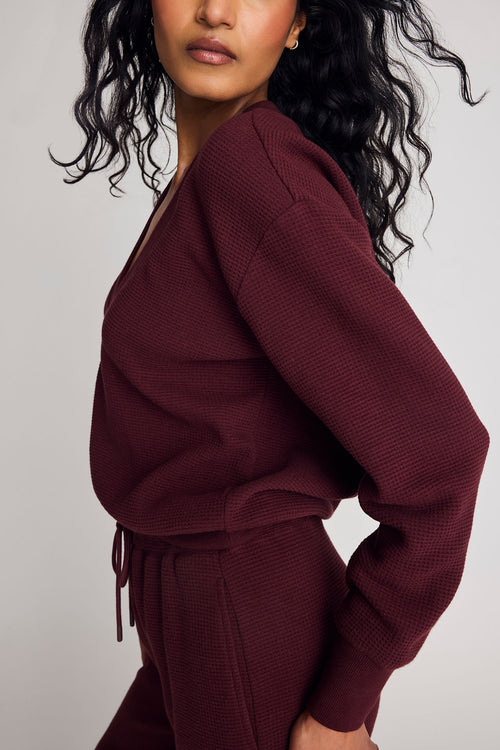 Garnet waffle knit deep-v sweatshirt, side view