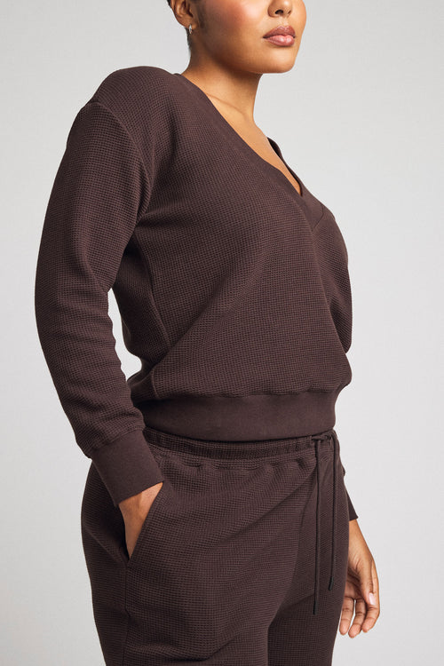 Dark brown waffle-knit deep V long-sleeve top with drawstring jogger pants