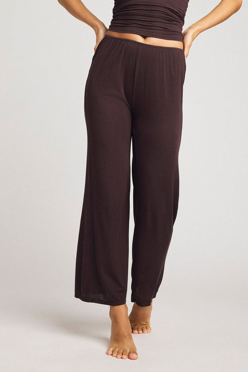 Dark brown cropped pants with wide legs and elastic waist