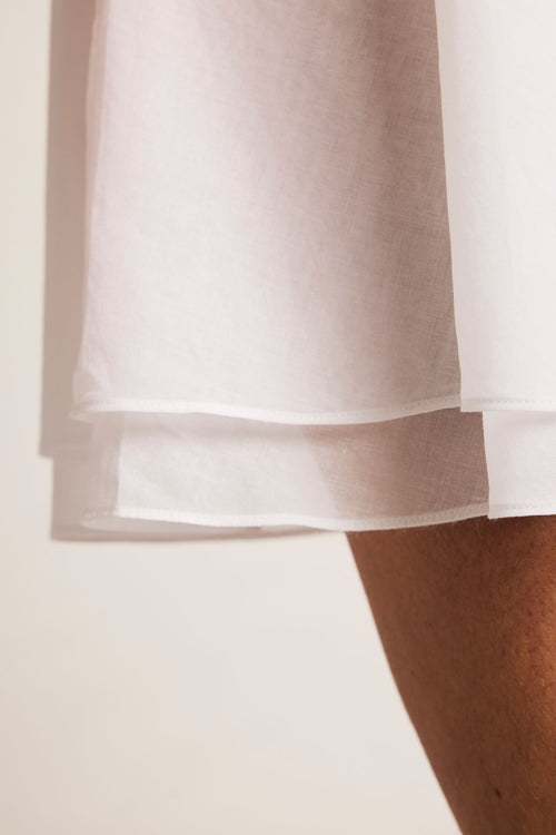 Island Dress in White hem detail
