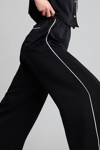 Detail view of Supreme Track Pant in Black for sizer