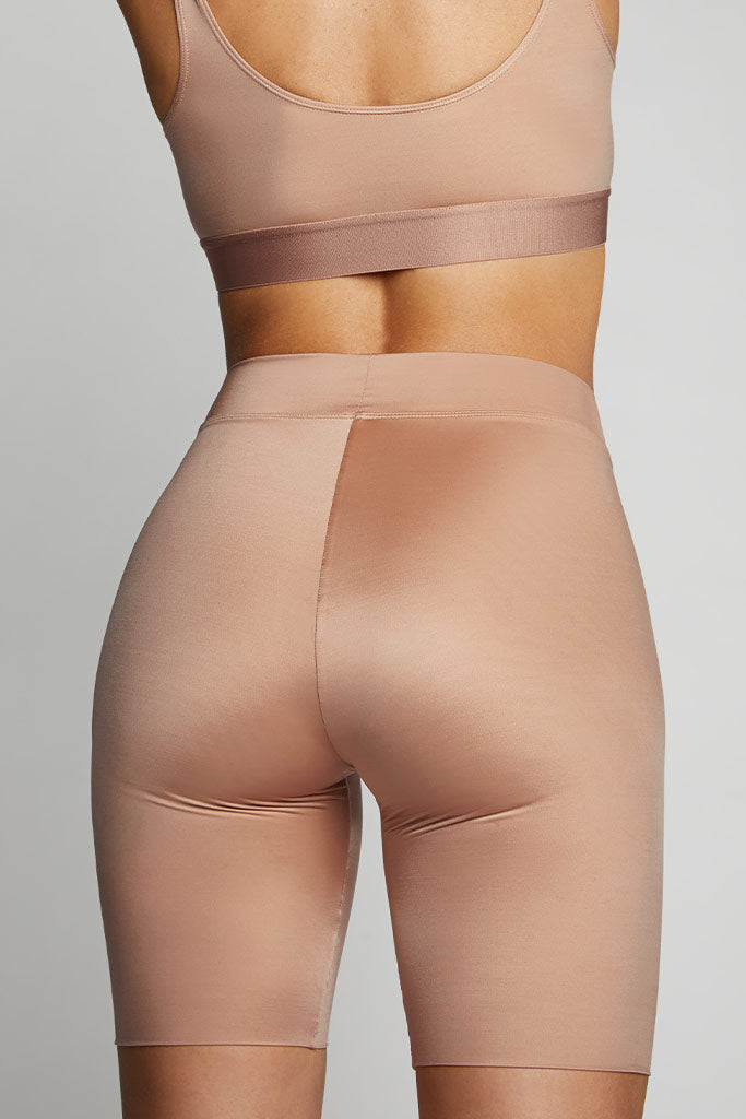 An athletic yet glam bike short in our caramely Buff tone [Sophia S]