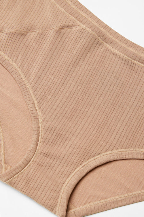 Drop-needle stitch creates a subtle, vertical stripe effect